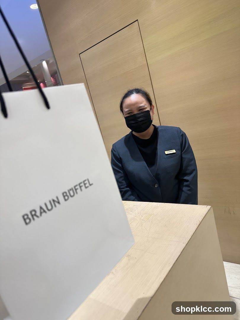 Sales Associate with Shopping Bag