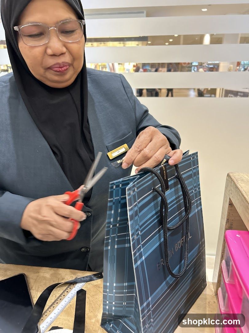 Employee preparing a shopping bag