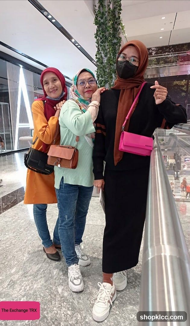 Three women posing for a photo