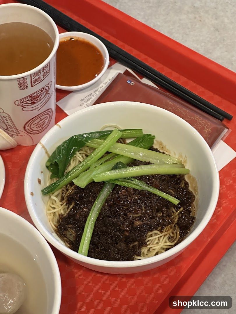 Noodles with sauce and greens