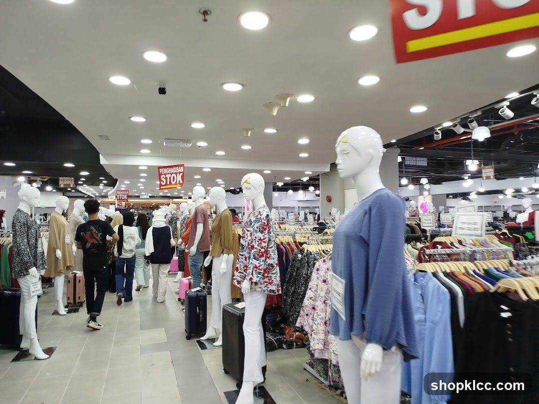 Clothing store interior with mannequins and clothing racks