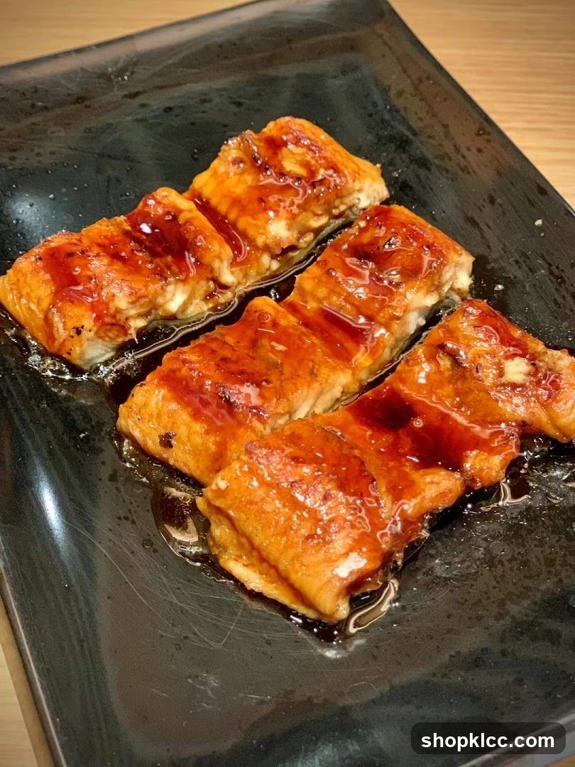 Unagi on a black plate