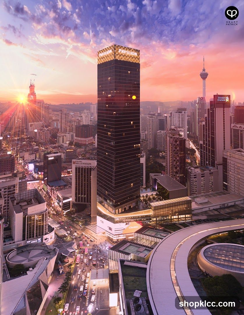 Cityscape at Sunset with Tall Building