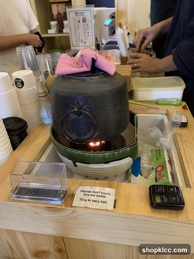 Tea Kettle with Warning Sign