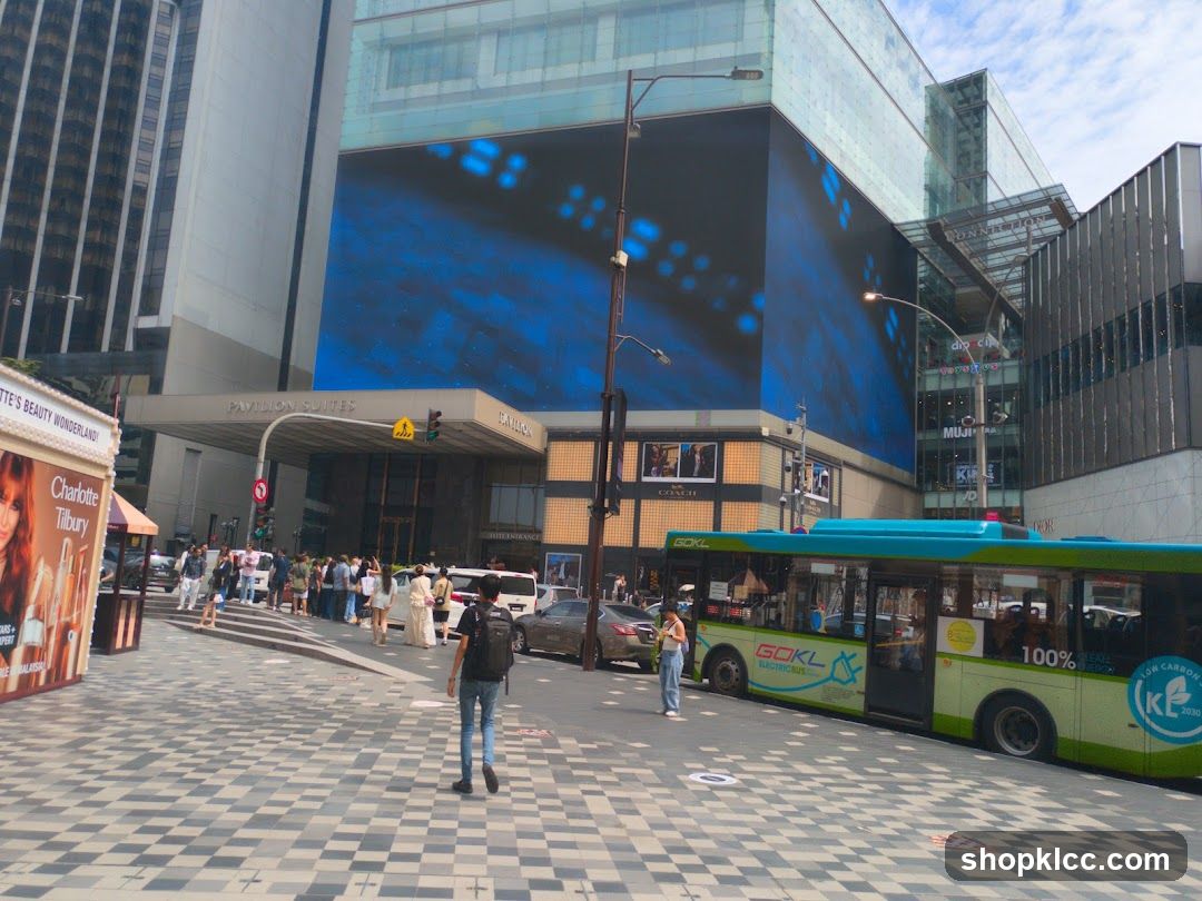 Street Scene with Pavilion Suites and Bus