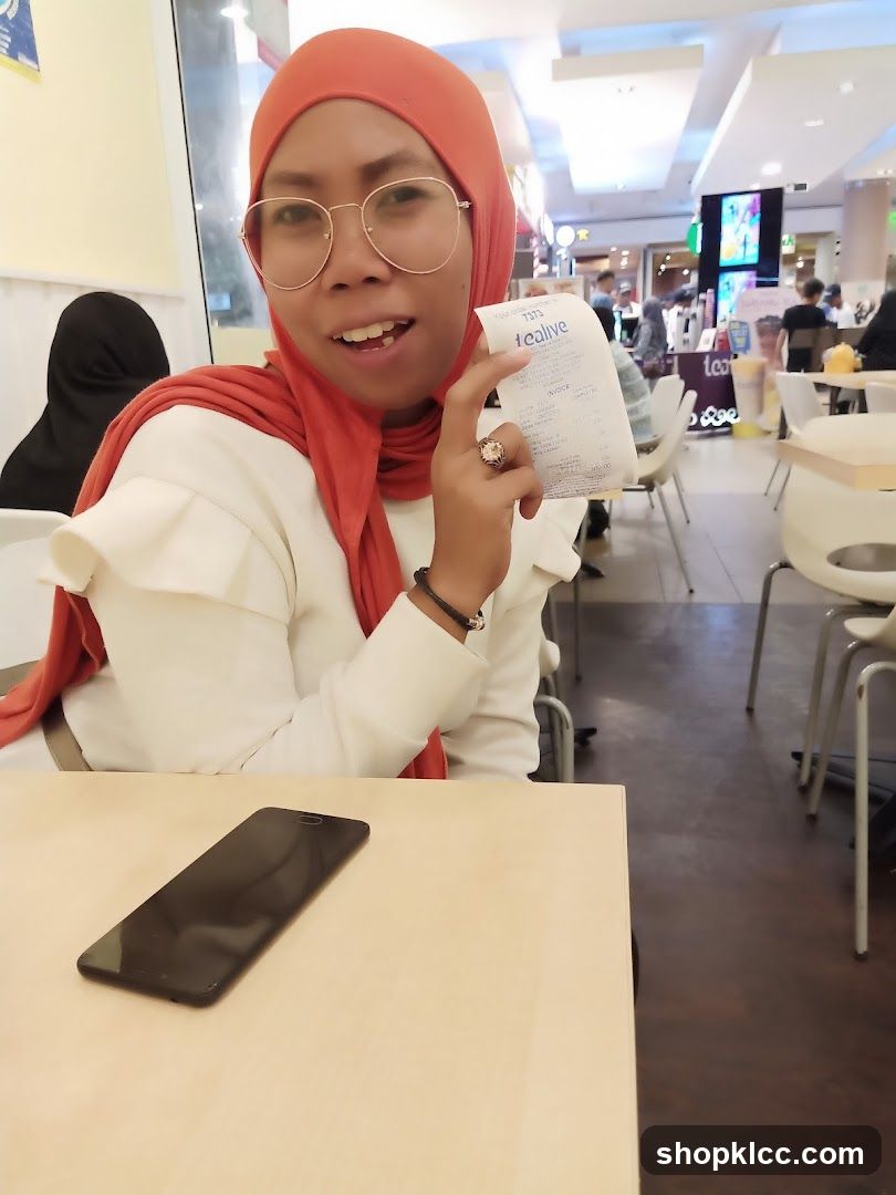 Woman holding a receipt
