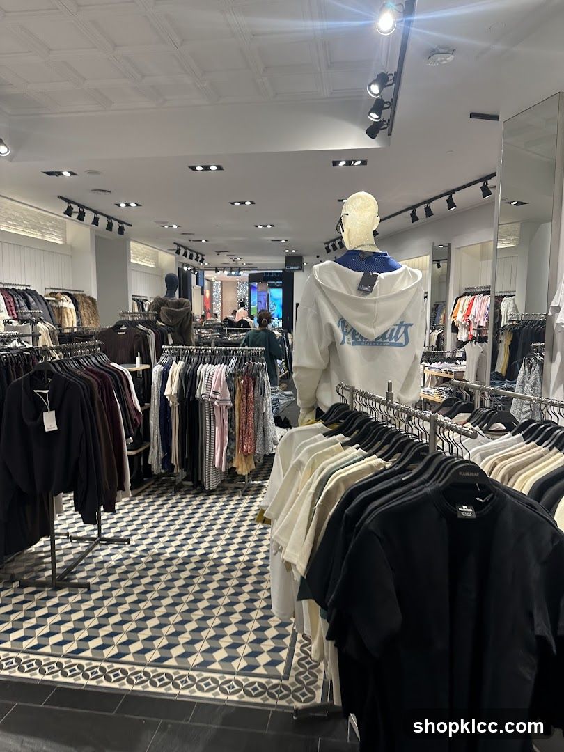 Clothing store interior with mannequins and racks of clothes