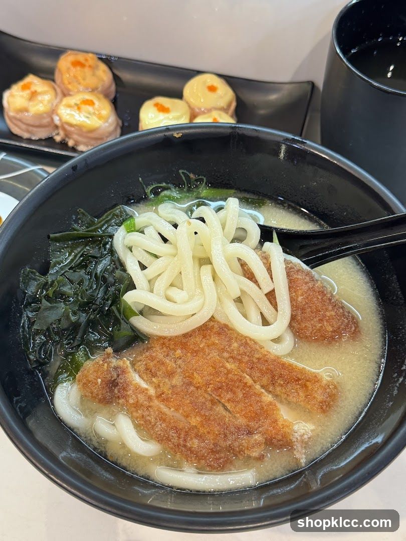 Udon Soup with Katsu and Sushi Rolls