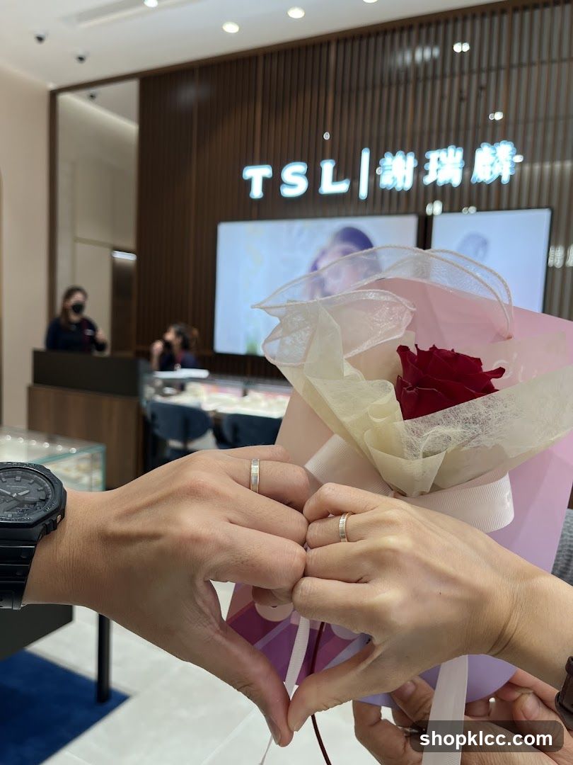 Couple showing off wedding rings