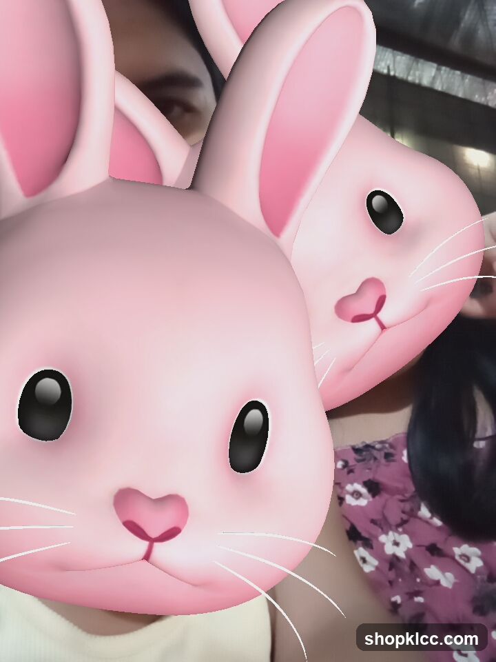 Two people with bunny filters