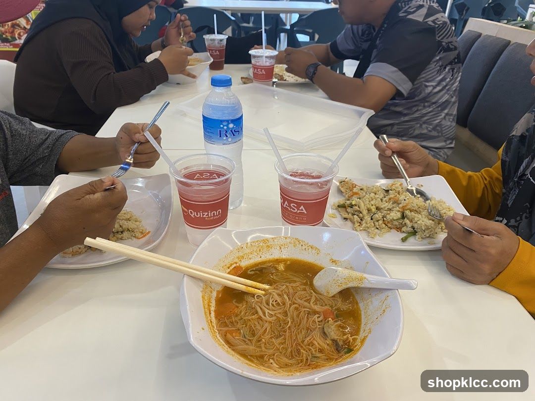 People eating at a food court
