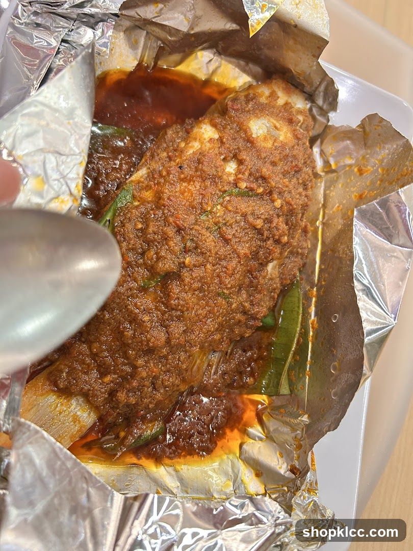 Fish in foil with sauce