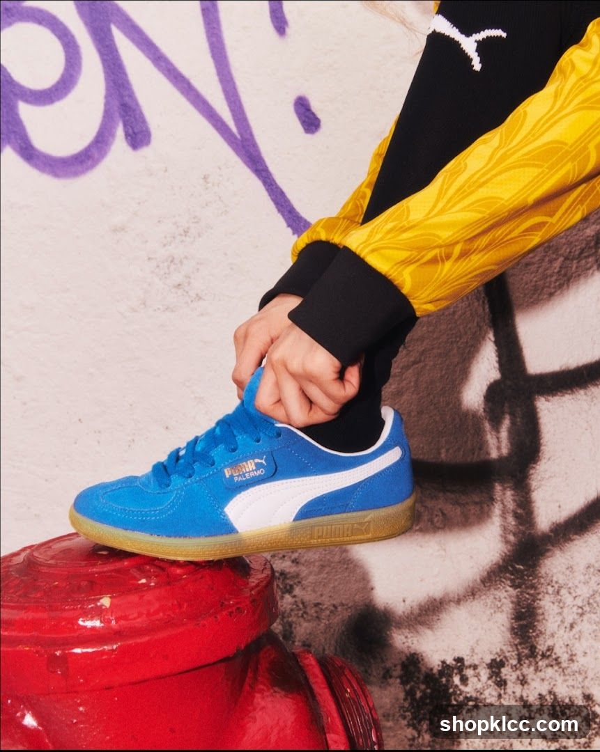 Puma Blue Sneaker on Red Fire Hydrant