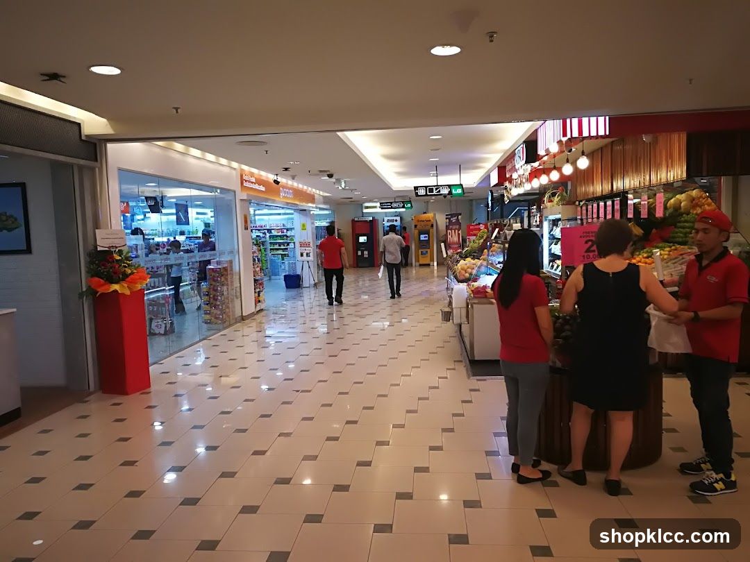 Shopping Mall Interior with Fruit Stand and Storefronts