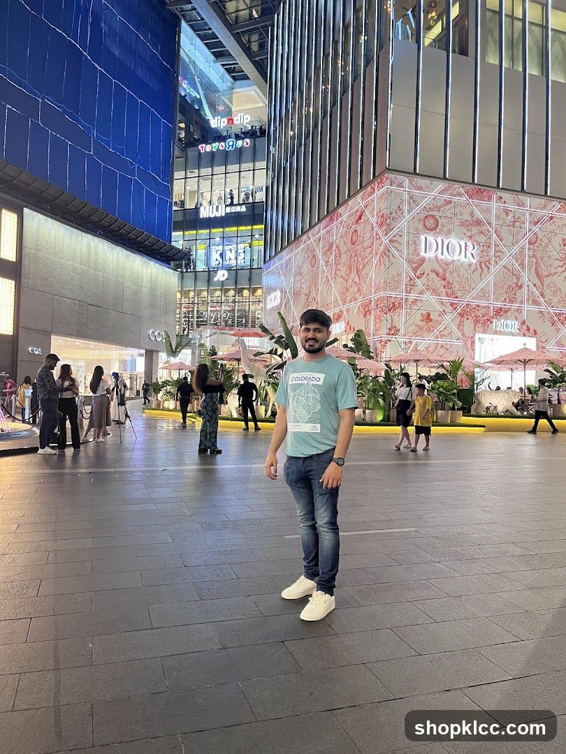 Man in Dior Storefront Plaza