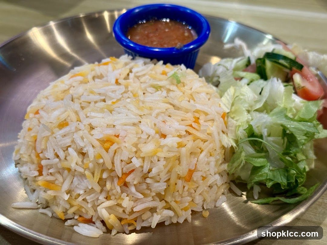 Rice Dish with Salad and Sauce
