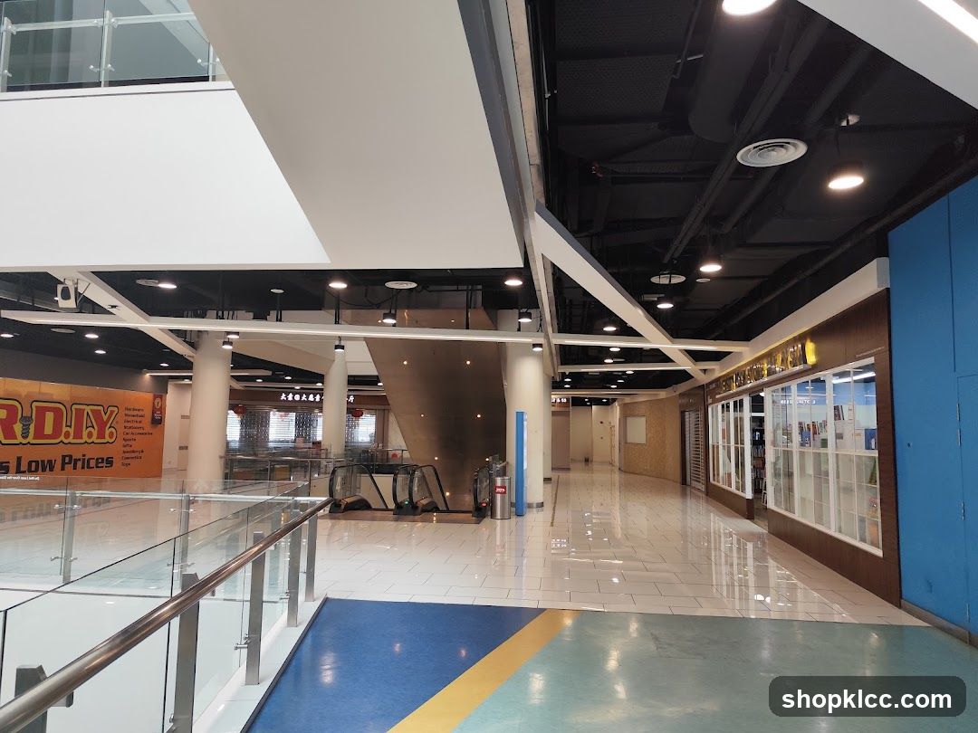 Shopping mall interior with escalators and shops
