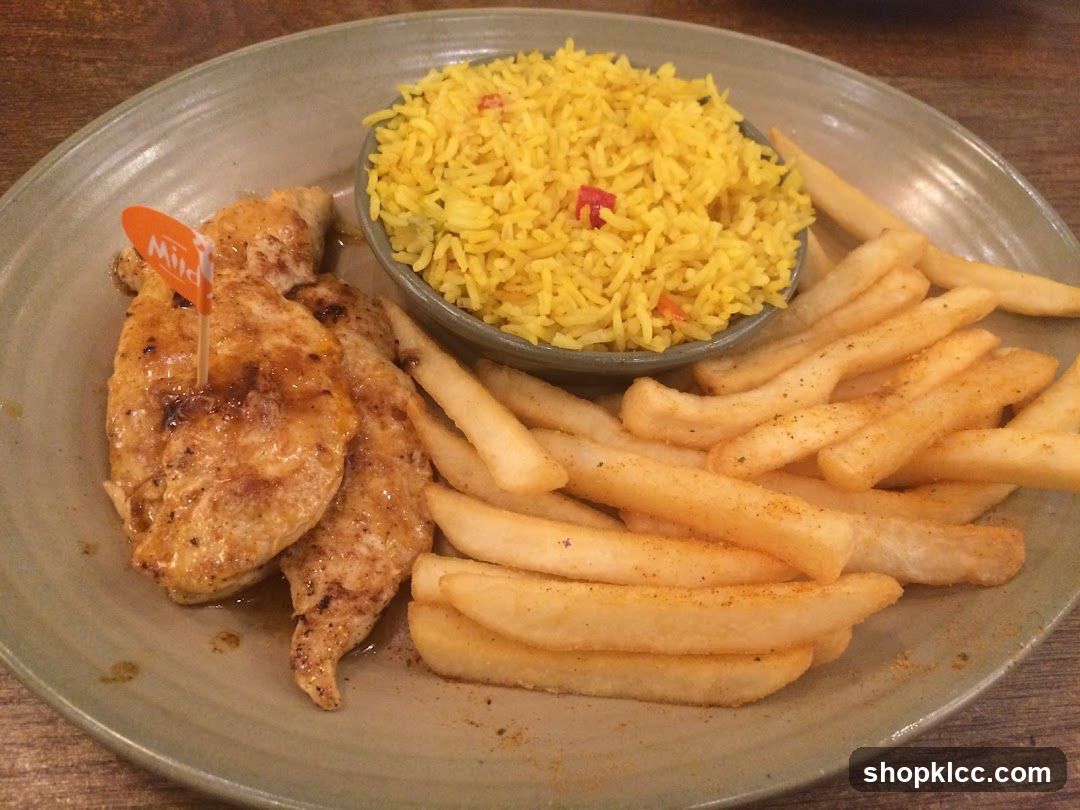 Chicken Strips with Rice and Fries