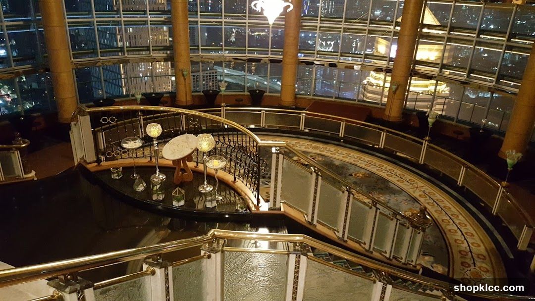 Grand Staircase Overlooking City Lights