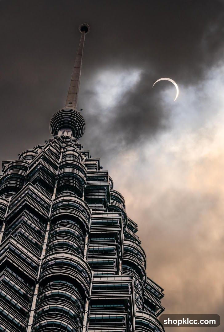 Solar Eclipse Over Skyscraper