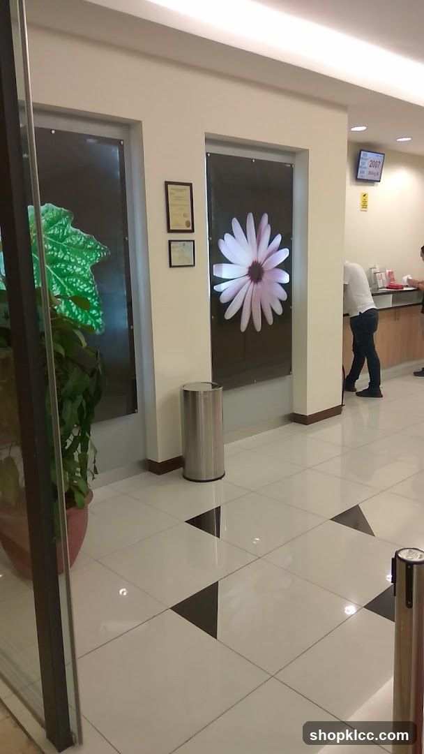 Interior of a building with artwork and a reception area