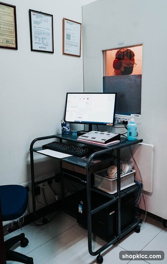 Computer workstation with sound booth