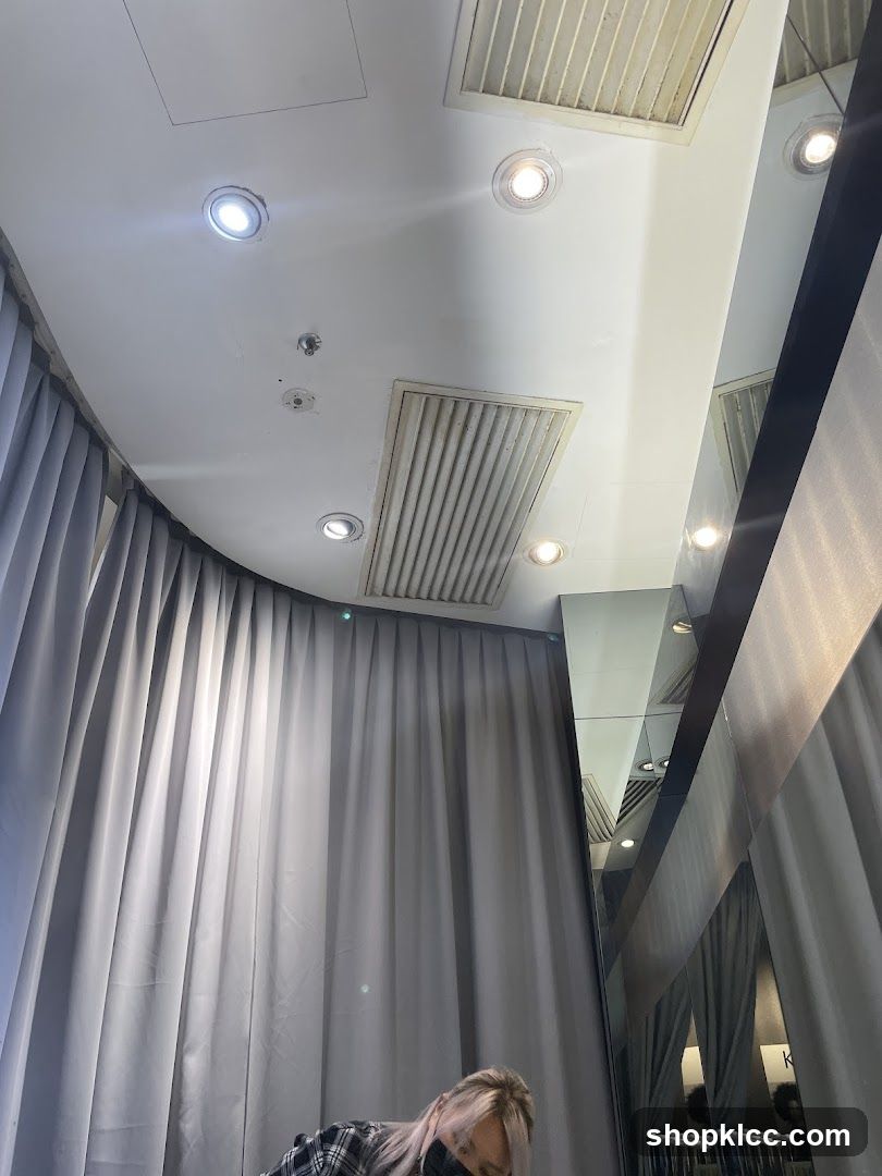 Interior of a store with curtains and mirrors