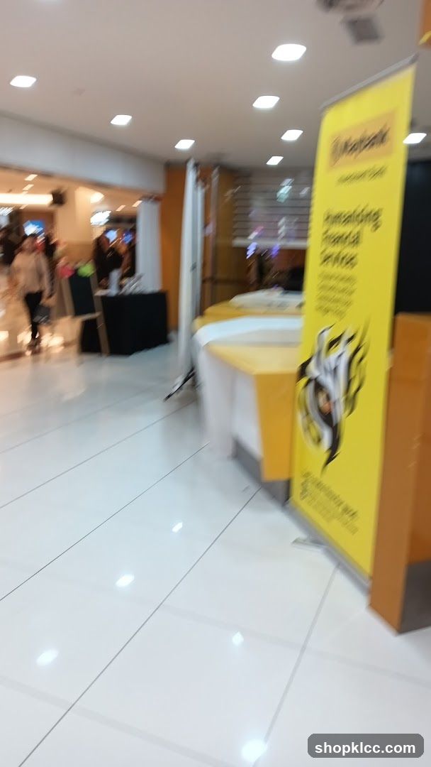 Mall interior with promotional banner