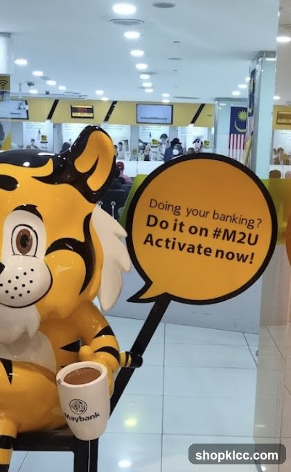 Tiger mascot with coffee cup and promotional sign
