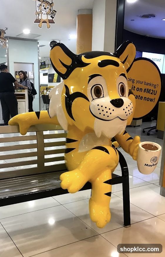 Tiger mascot with coffee cup