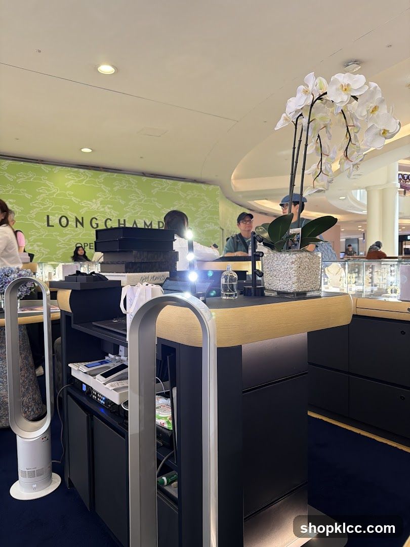 Retail Display with Orchid and Longchamp Signage