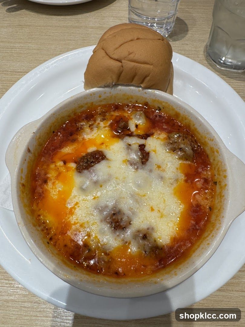 Baked Dish with Cheese and Bread Roll
