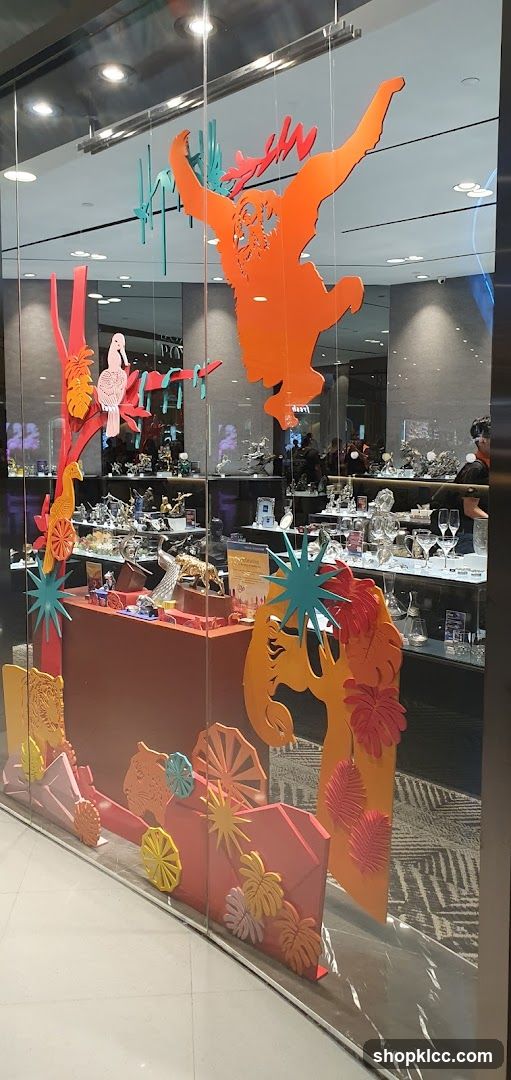 Store Window Display with Animal Silhouettes and Figurines