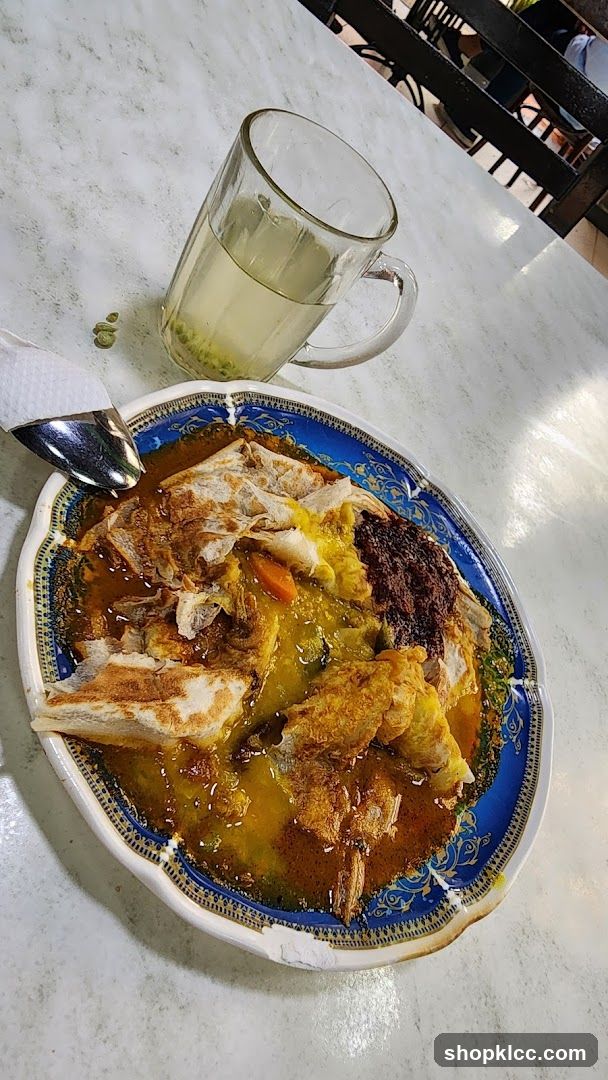 Roti Canai with Curry and Drink