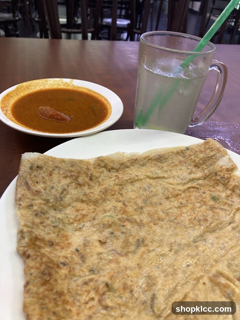 Roti Canai with Curry and Drink