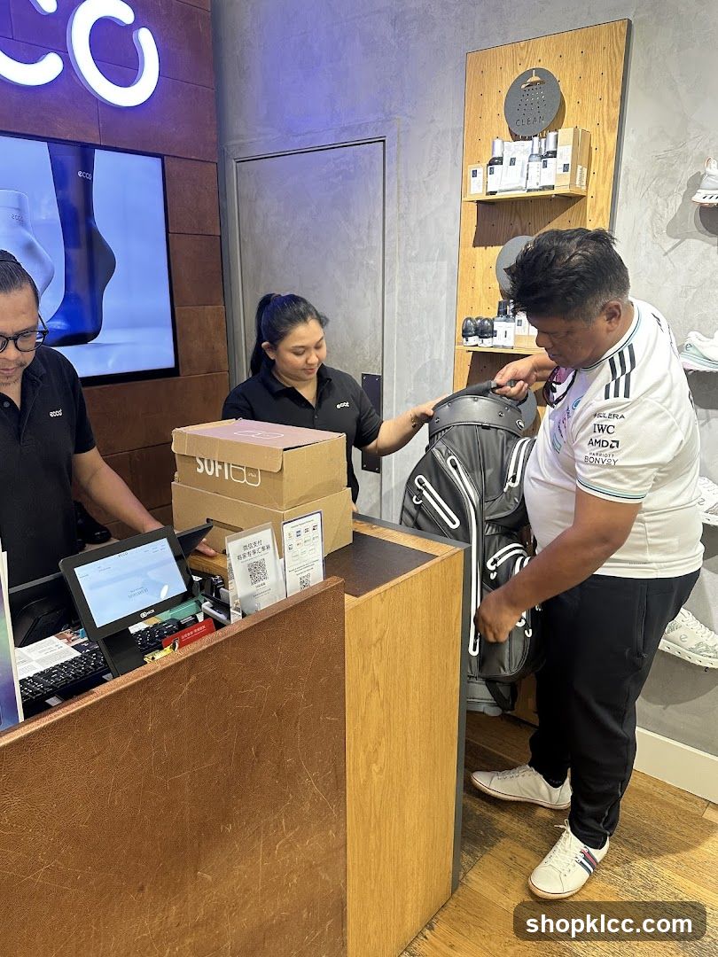 Store interior with staff and customer