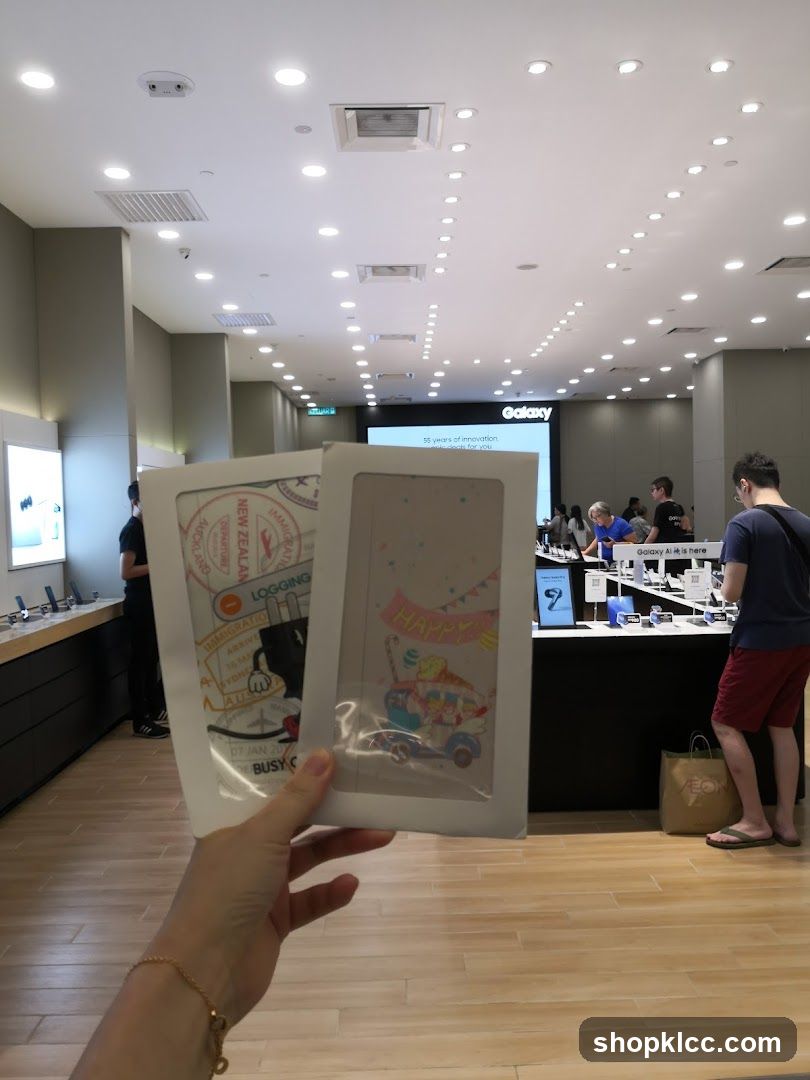 Samsung Store Interior with Hand Holding Phone Cases