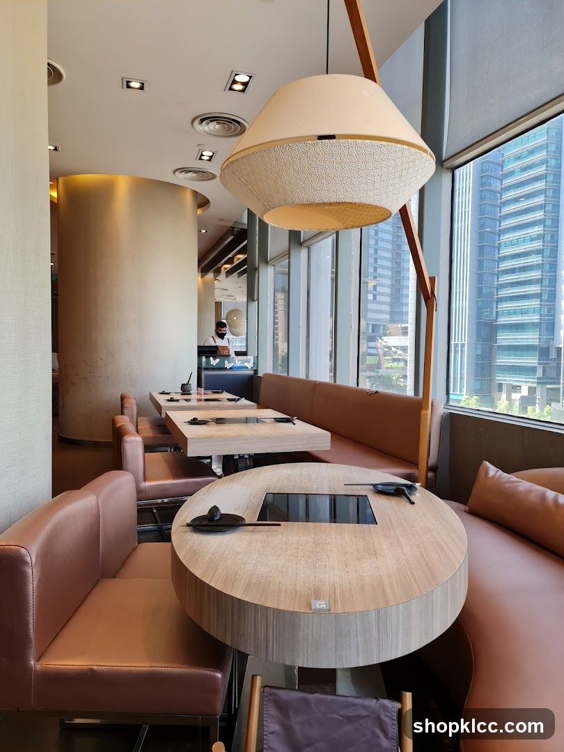 Restaurant Interior with Booth Seating and City View
