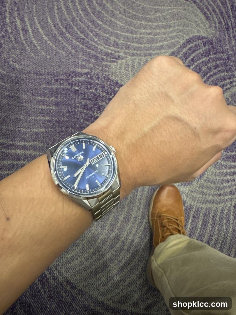 Man wearing a watch and shoes