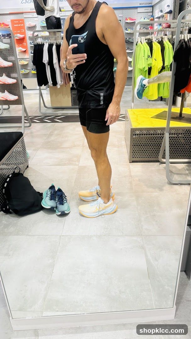 Man trying on shoes in a store
