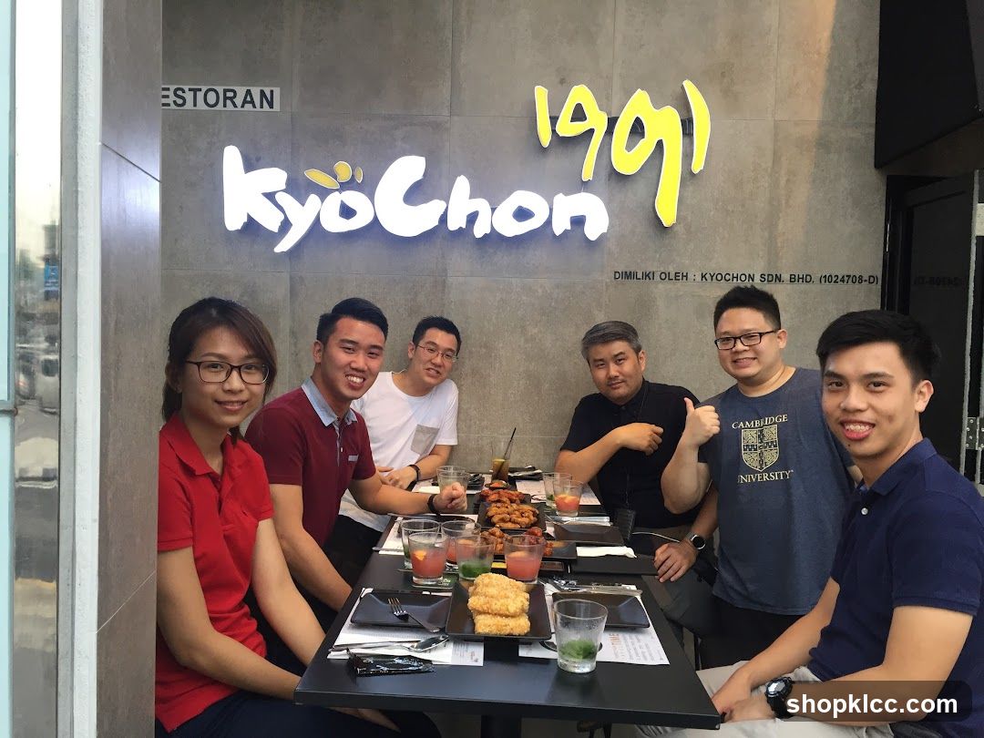 Group of people dining at KyoChon