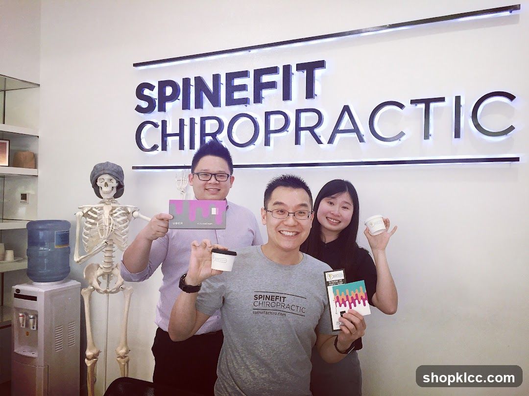Spinefit Chiropractic Staff with Promotional Items