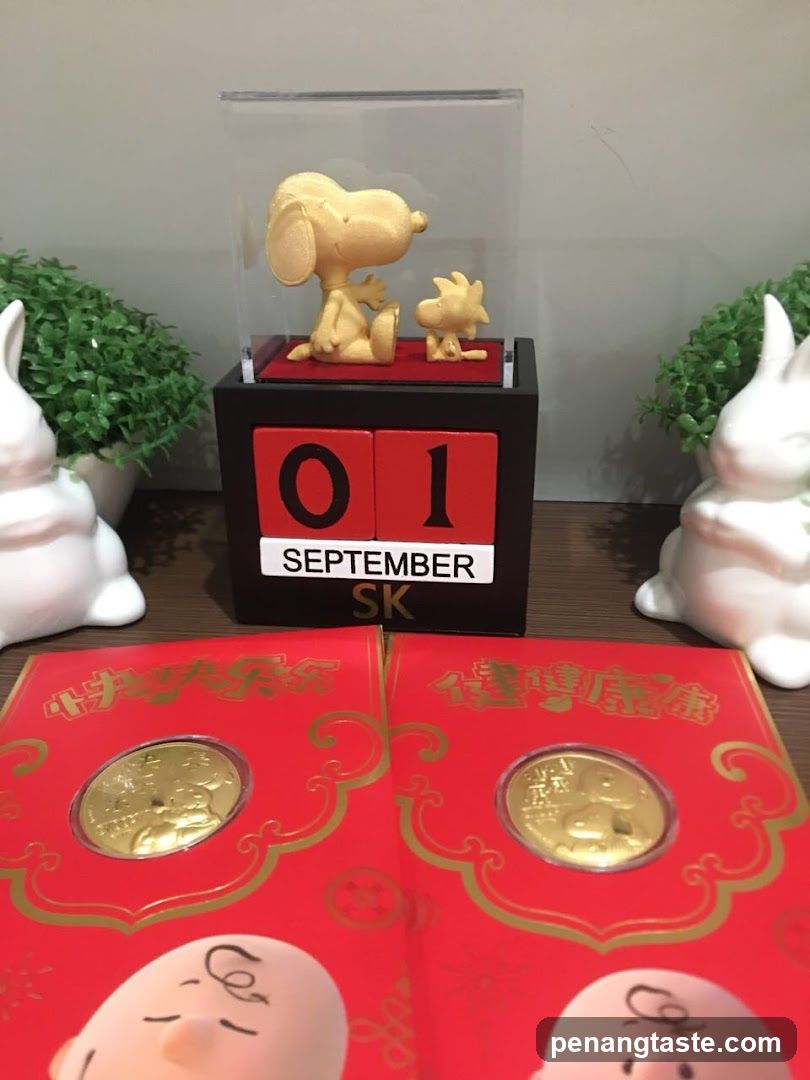 Snoopy and Woodstock Figurines with Commemorative Coins