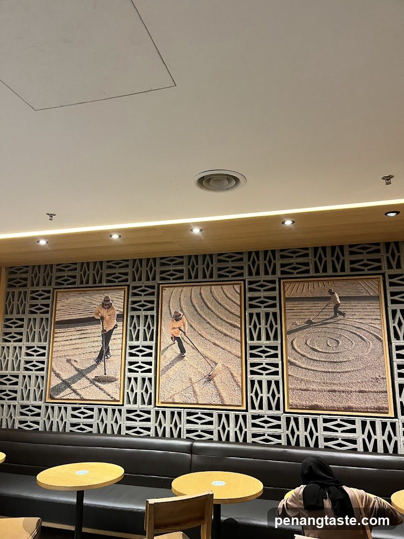 Interior of a cafe with artwork and seating