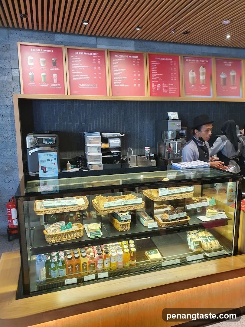 Cafe Counter with Pastries and Drinks