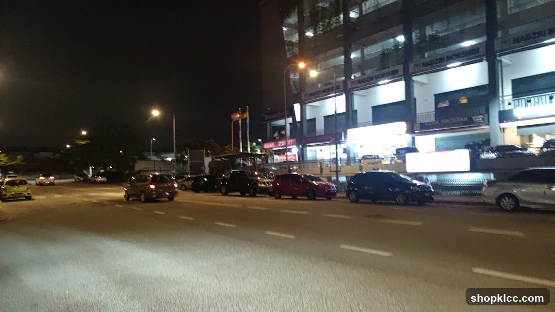 Street Scene at Night with Shops