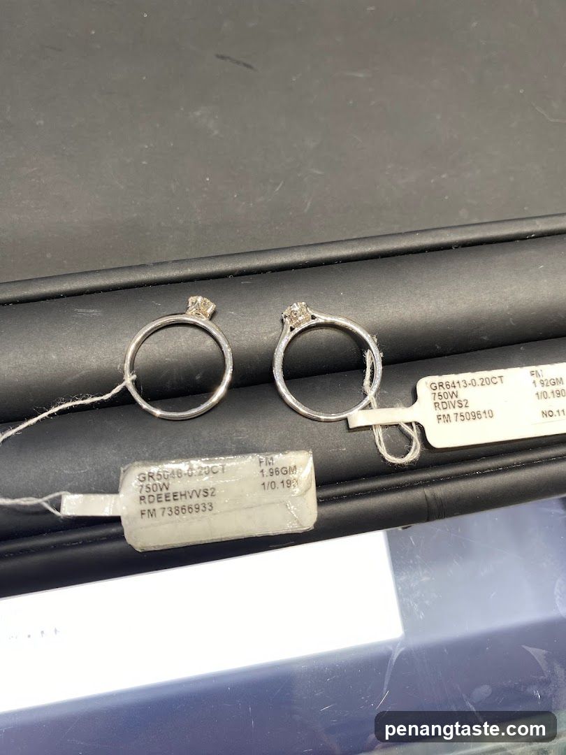 Two diamond rings with tags