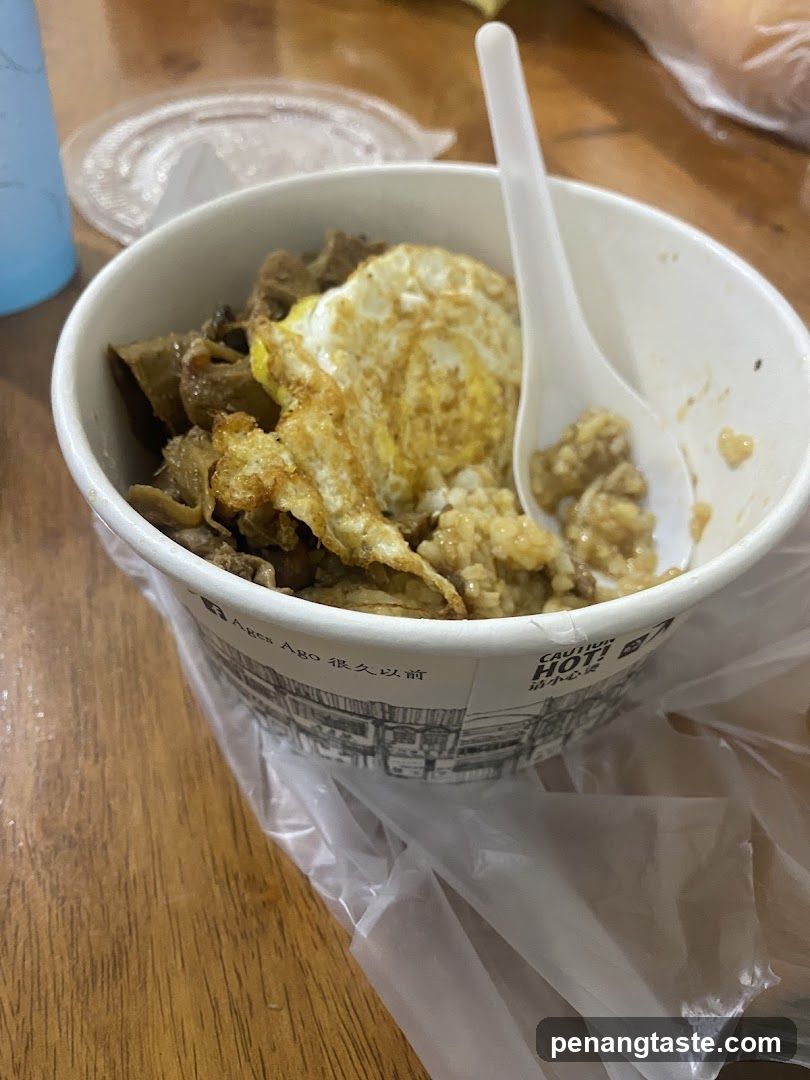 Rice bowl with fried egg and meat