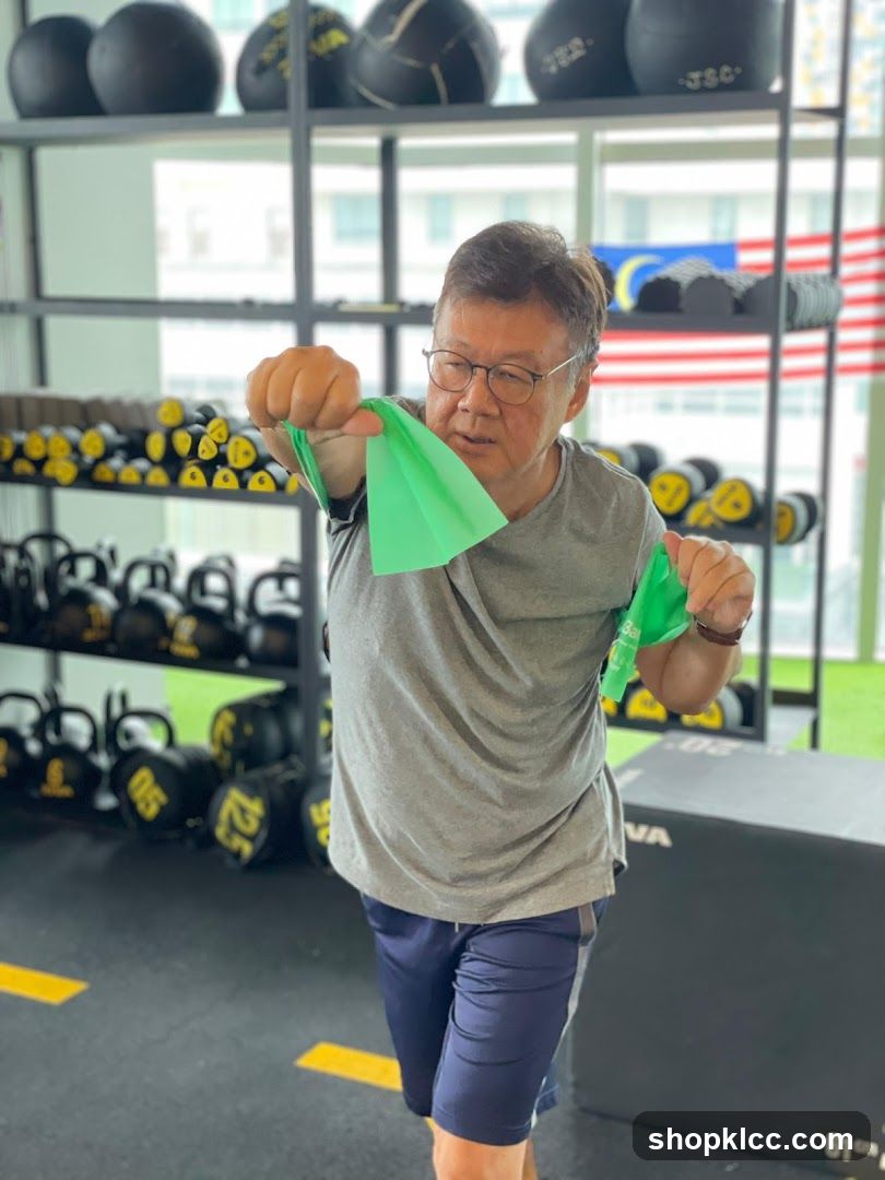 Man exercising with resistance band