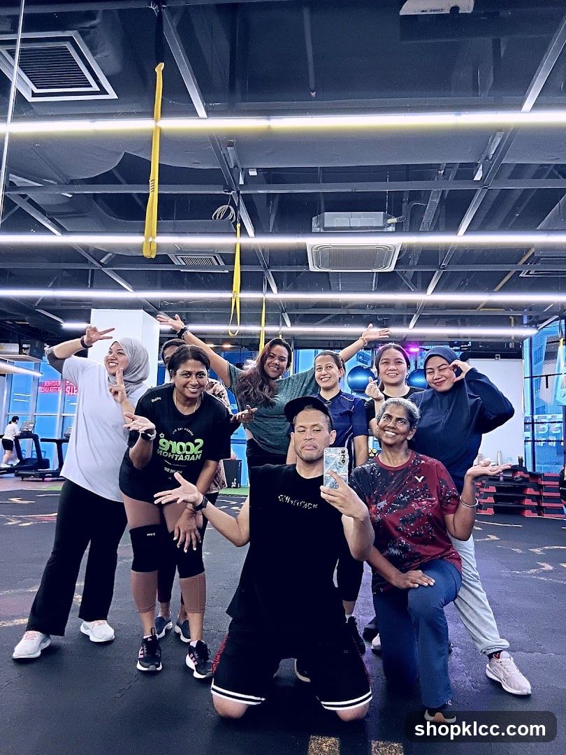 Group posing for a selfie in a gym